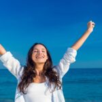 woman happy because tuesday affirmations